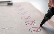 Image of series of ticks in boxes (Credit: Ralf Geithe / Adobe Stock)