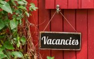 Old metal sign with the inscription Vacancies