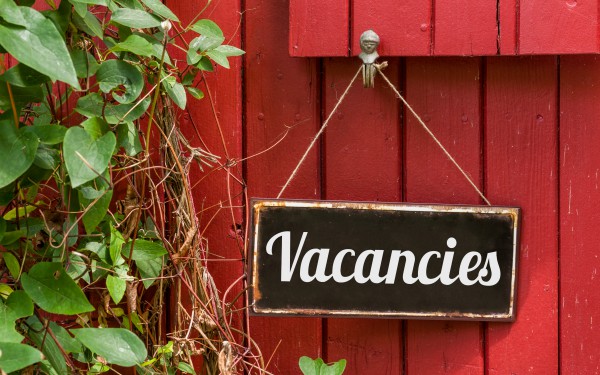 Old metal sign with the inscription Vacancies