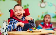 A disabled child in a chair