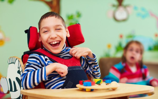 A disabled child in a chair