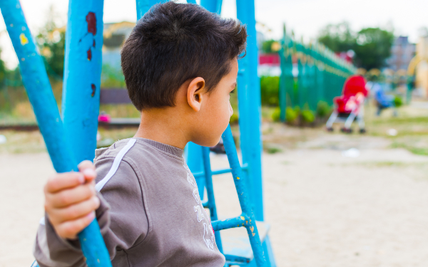 boy swinging on a swing
