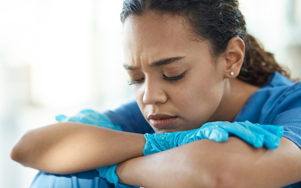 Care worker or nurse looking stressed