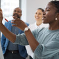Colleagues engaged in training session