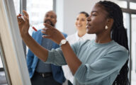 Colleagues engaged in training session