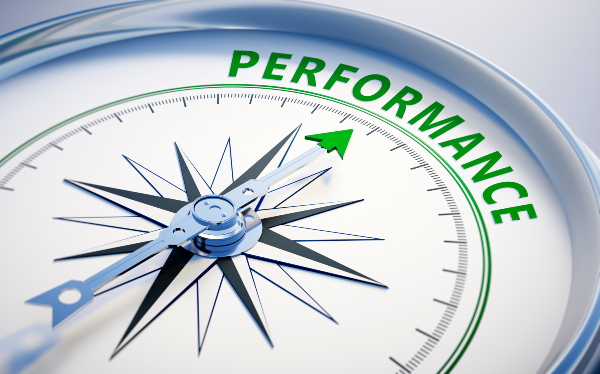 Compass dial pointing to word 'performance'