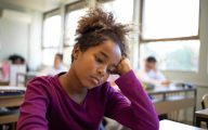 Portrait of schoolgirl feeling sad