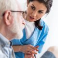 Home care worker speaking to older person