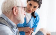 Home care worker speaking to older person