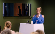 Award-winning author Jenny Molloy speaking at Community Care Live 2023