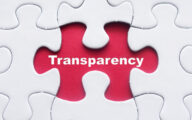 Jigsaw with piece missing revealing the word 'Transparency'