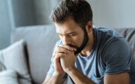 Man looking downcast