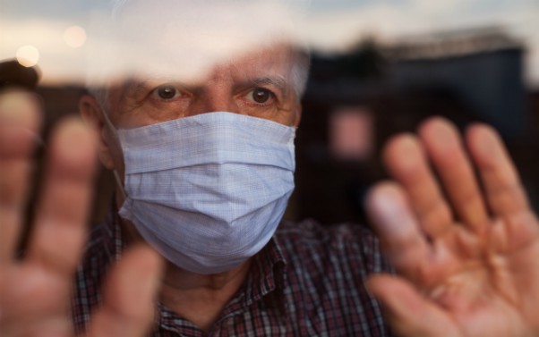 Older_man_at_care home window