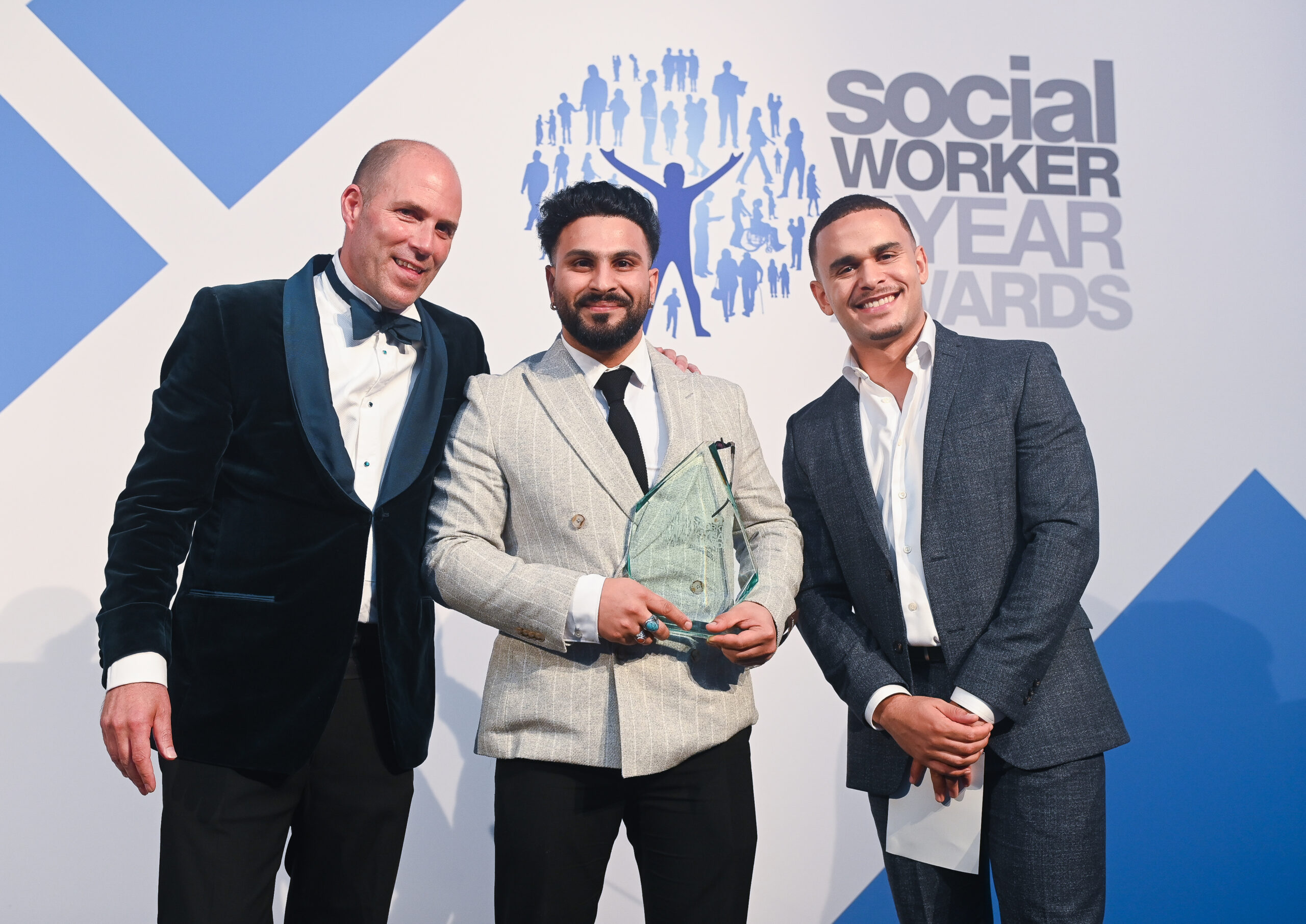 (L-R) Headline Sponsor Sanctuary Personnel CEO James Rook, Omaid Badar, Broadcaster and journalist Ashley John-Baptiste. (credit: Social Work Awards)