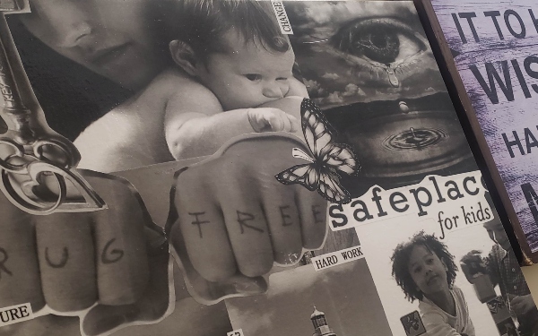 Wall collage made by mothers at Jasmine Mother's Recovery Centre, including images of mothers and children, the words 'drug free', 'hard work' and 'safe place for kids;