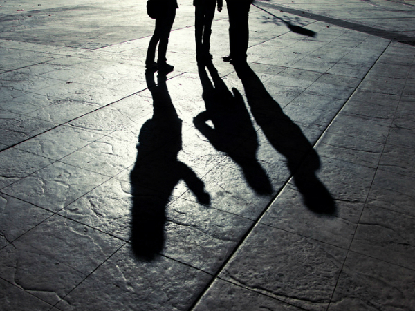 Shadows of people talking