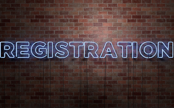 The word 'registration' in neon lights