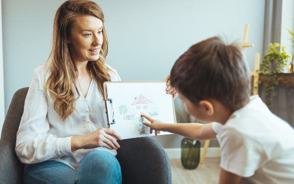 Social worker doing direct work with child