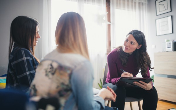 Social worker on home visit