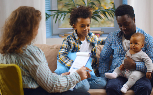 Social worker with two young children