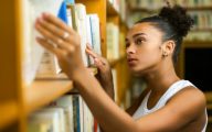 Black student in university library