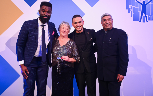Lifetime award gold winner Susan Banyard, pictured with Vava Tampa (left) and Janati Champaneri (right) from headline sponsor BASW England and journalist and awards presenter Ashley John-Baptiste