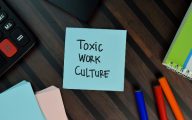 Toxic work culture written on postit note