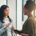 Two social workers meeting