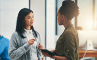 Two social workers meeting