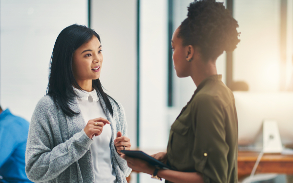 Two social workers meeting