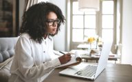 Young social worker working remotely